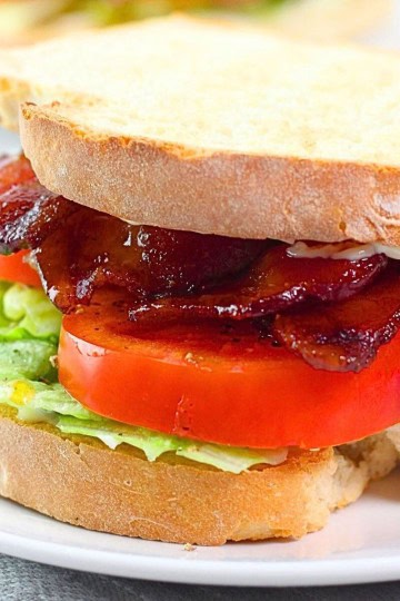 maple bacon BLT sandwich on a white plate